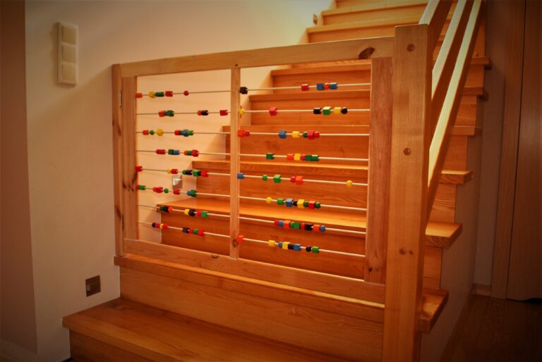 Baby gate in the style of an abacus