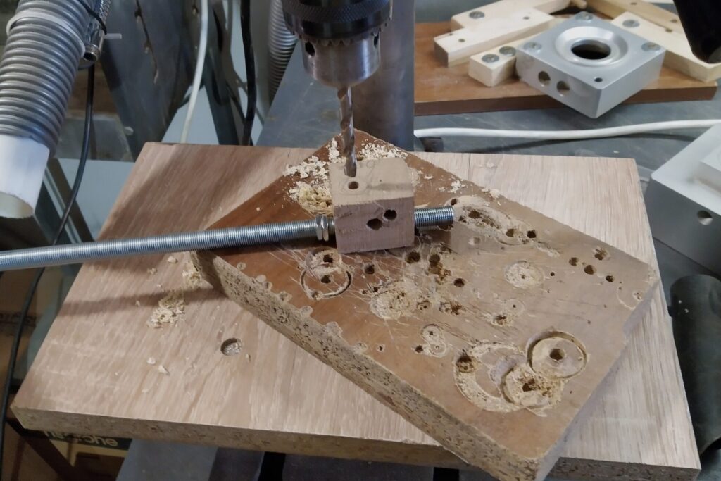 Eoncrafts bedside lamps jig to drill a hole in a metal tube